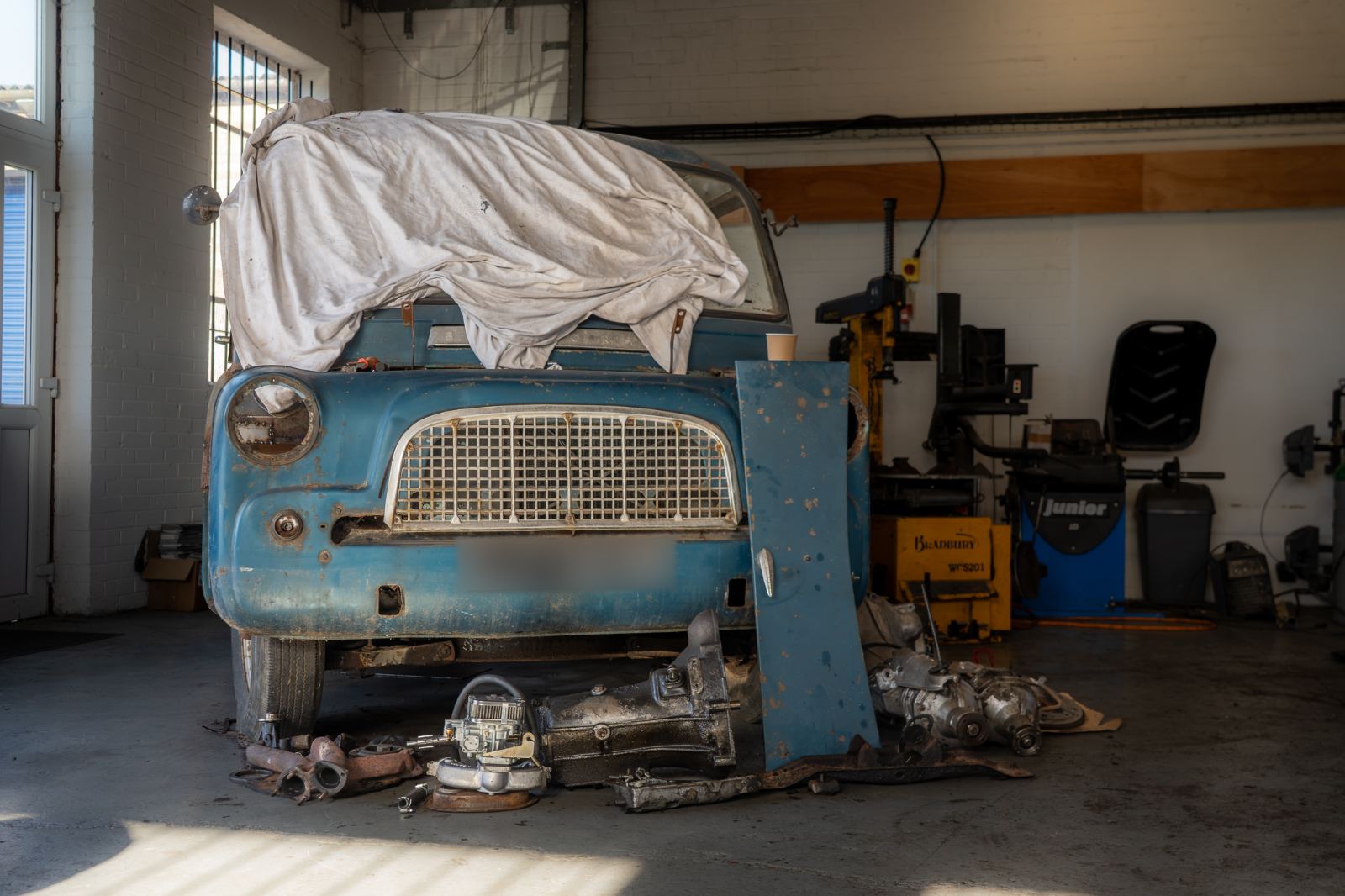 A classic van part-way through restoration in the workshop